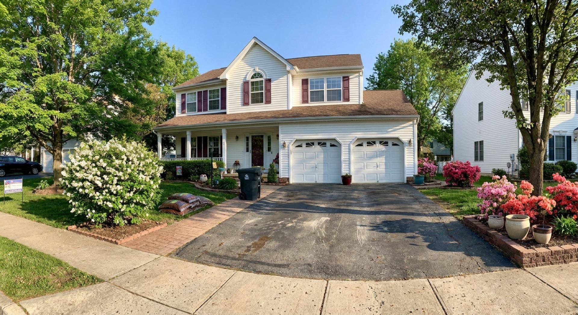 Cracked asphalt driveway before repair Leesburg VA